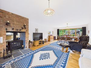 LIVING ROOM WITH STOVE FIREPLACE- click for photo gallery